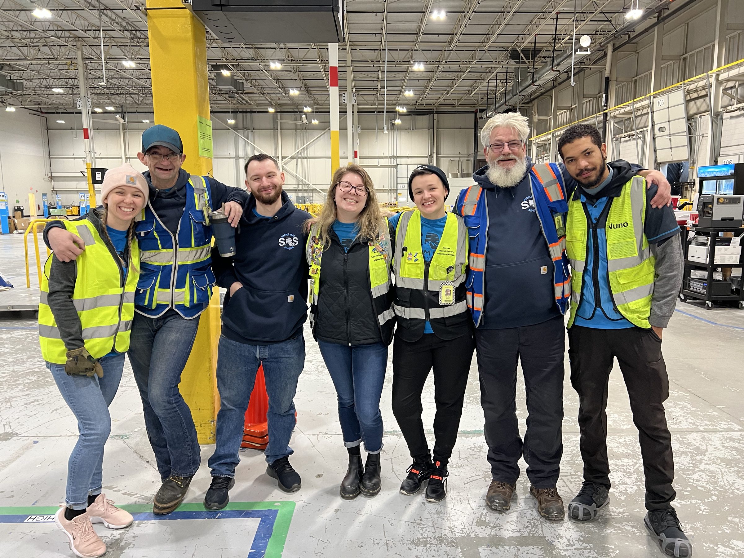 Adam with the SDS team on the warehouse floor