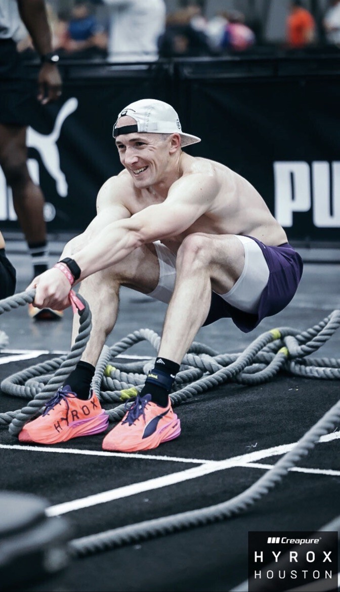 Adam on the sled pull at HYROX Houston