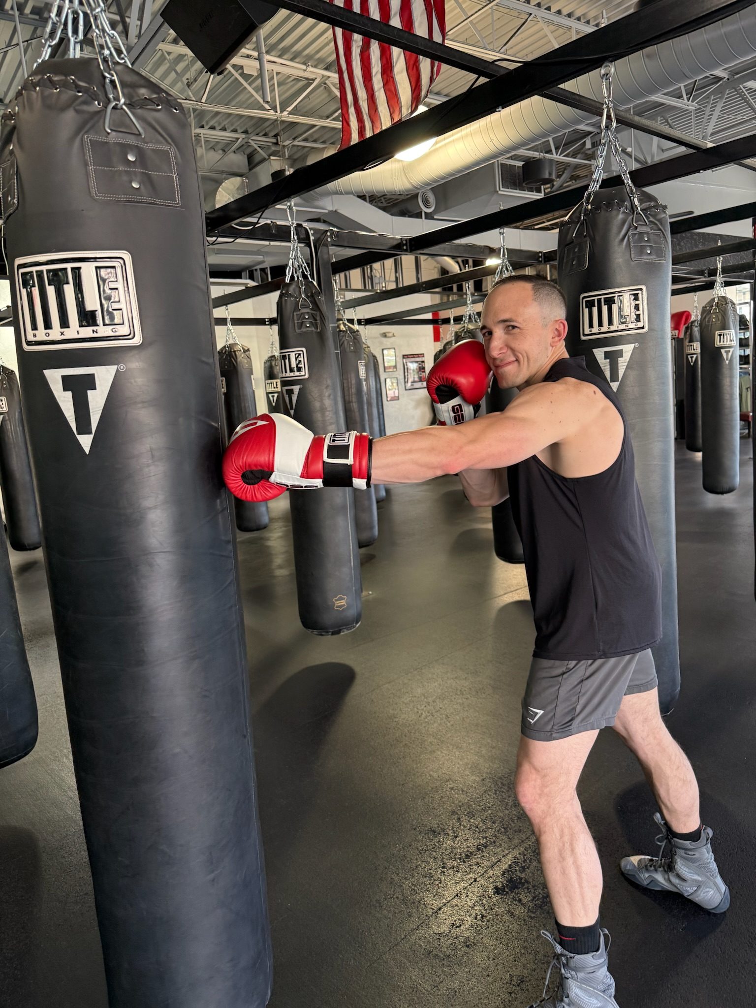 Adam on the heavy bag at Title Boxing